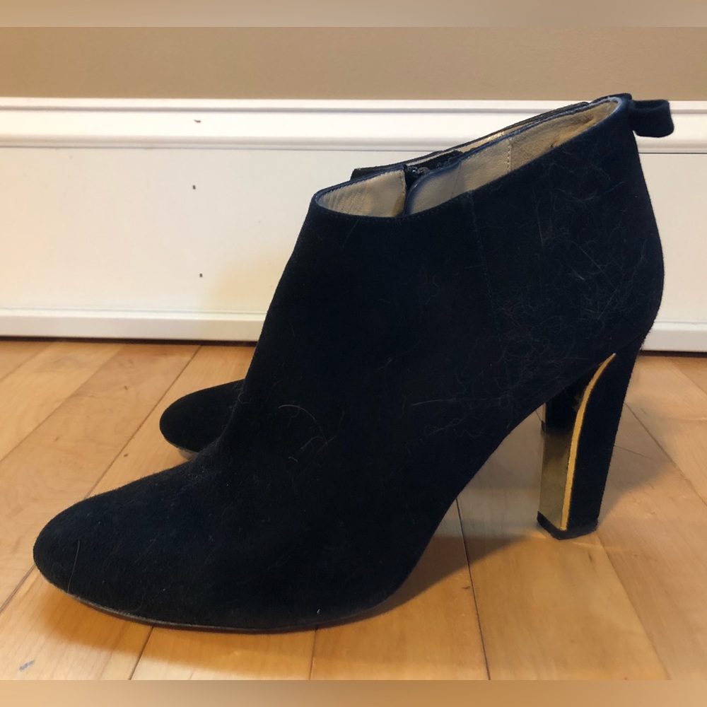 Great pair of black suede Kate Spade booties with gold and bow accents 9.5